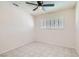 Bedroom with tile floors and ceiling fan at 4386 El Carnal Way, Las Vegas, NV 89121