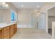 Spa-like bathroom featuring a soaking tub, double vanity and shower at 866 La Sconsa Dr, Las Vegas, NV 89138