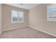 Spacious bedroom with neutral decor and plantation shutters at 866 La Sconsa Dr, Las Vegas, NV 89138