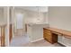 Upstairs hallway with built-in desk and wood railing at 866 La Sconsa Dr, Las Vegas, NV 89138