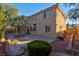 Two story house exterior with backyard patio and landscaping at 866 La Sconsa Dr, Las Vegas, NV 89138