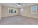 Spacious main bedroom with ceiling fan and carpet flooring at 866 La Sconsa Dr, Las Vegas, NV 89138