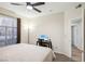 Bright bedroom featuring a ceiling fan and ample space at 8737 Red Brook Dr # 103, Las Vegas, NV 89128