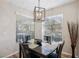 Charming dining area with a table and four chairs, offering natural light at 8737 Red Brook Dr # 103, Las Vegas, NV 89128