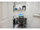 Small home office with desk, chair, and ample shelving at 8737 Red Brook Dr # 103, Las Vegas, NV 89128