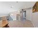 Open and airy hallway with a view of a grand chandelier at 8904 Saint Pierre Dr, Las Vegas, NV 89134