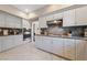 Spacious kitchen featuring stainless steel appliances and granite countertops at 8904 Saint Pierre Dr, Las Vegas, NV 89134