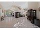 Open living room with high ceilings and elegant chandelier at 8904 Saint Pierre Dr, Las Vegas, NV 89134