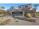 Inviting community entrance sign amidst desert landscaping, showcasing a welcoming neighborhood at 234 Polaris Ridge Ave, Henderson, NV 89011