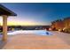 Expansive pool and patio with city views at sunset at 49 Vista Outlook St, Henderson, NV 89011