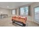 Dining area with wood-look floors and access to patio at 50 Aura De Blanco St # 17101, Henderson, NV 89074