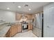 Well-equipped kitchen featuring stainless steel appliances at 50 Aura De Blanco St # 17101, Henderson, NV 89074