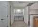 Stacked washer and dryer in a laundry closet at 50 Aura De Blanco St # 17101, Henderson, NV 89074