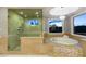 Elegant bathroom features a jetted tub, walk-in shower, and picturesque window views at 8 Rue Mediterra Dr, Henderson, NV 89011