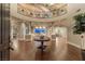 Grand foyer with soaring ceilings, dark hardwood floors, and an elegant staircase, creating a stunning first impression at 8 Rue Mediterra Dr, Henderson, NV 89011