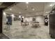 Large entertainment area with pool tables, bar stools, and a Raiders themed decor at 8 Rue Mediterra Dr, Henderson, NV 89011