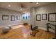 Home gym featuring hardwood floors, natural light, and workout equipment at 8 Rue Mediterra Dr, Henderson, NV 89011