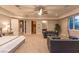 Spacious main bedroom with sitting area, walk-in closet, and en-suite bathroom at 8 Rue Mediterra Dr, Henderson, NV 89011