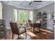 Charming home office with hardwood floors, lots of light, and decorative shelving at 8 Rue Mediterra Dr, Henderson, NV 89011