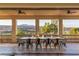 Covered outdoor dining area with sunset views at 8 Rue Mediterra Dr, Henderson, NV 89011