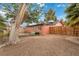 Spacious backyard with a patio seating area, offering space to relax and entertain guests at 1925 Franklin Ave, Las Vegas, NV 89104