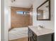 Well-lit bathroom features a tiled shower over tub, providing a clean and functional space at 1925 Franklin Ave, Las Vegas, NV 89104