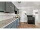 Functional kitchen with ample counter space and a view through an arched window at 1925 Franklin Ave, Las Vegas, NV 89104