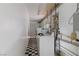 Functional laundry room with washer, dryer, and checkered flooring at 1925 Franklin Ave, Las Vegas, NV 89104
