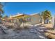 Large backyard with patio, garden area, and storage shed at 3189 Lipton Ct, Las Vegas, NV 89121