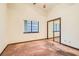 Bedroom with ceiling fan and mirrored closet doors at 3189 Lipton Ct, Las Vegas, NV 89121