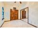 Bedroom with mirrored closet doors and ceiling fan at 3189 Lipton Ct, Las Vegas, NV 89121