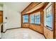 Cozy dining area with wood paneled walls and large windows at 3189 Lipton Ct, Las Vegas, NV 89121