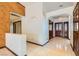 Bright entryway with tile floors and wood-paneled wall at 3189 Lipton Ct, Las Vegas, NV 89121