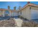 Front entry and walkway of a single-story house with gated entry at 3189 Lipton Ct, Las Vegas, NV 89121