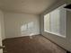 Simple bedroom with neutral wall and carpet at 5179 Silica Chalk Ave, Las Vegas, NV 89115