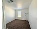 Bright bedroom with neutral walls and carpeted floors at 5179 Silica Chalk Ave, Las Vegas, NV 89115