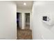 Hallway with access to bathroom and bedrooms at 5179 Silica Chalk Ave, Las Vegas, NV 89115