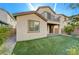 Two-story home with a balcony overlooking the backyard at 3164 Rowan Brook Ave, Henderson, NV 89052