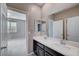 Clean bathroom with double vanity and a view of bedroom at 3164 Rowan Brook Ave, Henderson, NV 89052