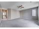 Large bedroom with carpet, ceiling fan and access to bath at 3164 Rowan Brook Ave, Henderson, NV 89052