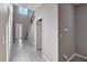 Bright entryway with tile flooring and staircase at 3164 Rowan Brook Ave, Henderson, NV 89052