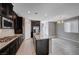 Modern kitchen with island, stainless steel appliances, and granite countertops at 3164 Rowan Brook Ave, Henderson, NV 89052