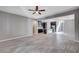 Open living room with a view of the kitchen and tile floors at 3164 Rowan Brook Ave, Henderson, NV 89052