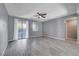 Spacious living room with tile floors and sliding glass doors leading to the backyard at 3164 Rowan Brook Ave, Henderson, NV 89052
