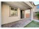 Covered patio with sliding door access and brick pavers at 3164 Rowan Brook Ave, Henderson, NV 89052