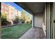 Covered patio with brick pavers and a view of the backyard at 3164 Rowan Brook Ave, Henderson, NV 89052