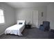 Well-lit bedroom with soft carpet at 7047 Noble Flair Ct, Las Vegas, NV 89131