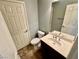 Clean bathroom with toilet, sink, and vanity at 11416 Belmont Lake Dr # 102, Las Vegas, NV 89135