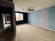 Large bedroom with ceiling fan and two-tone painted walls at 11416 Belmont Lake Dr # 102, Las Vegas, NV 89135