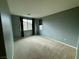 Spacious bedroom with neutral walls and carpet flooring at 11416 Belmont Lake Dr # 102, Las Vegas, NV 89135